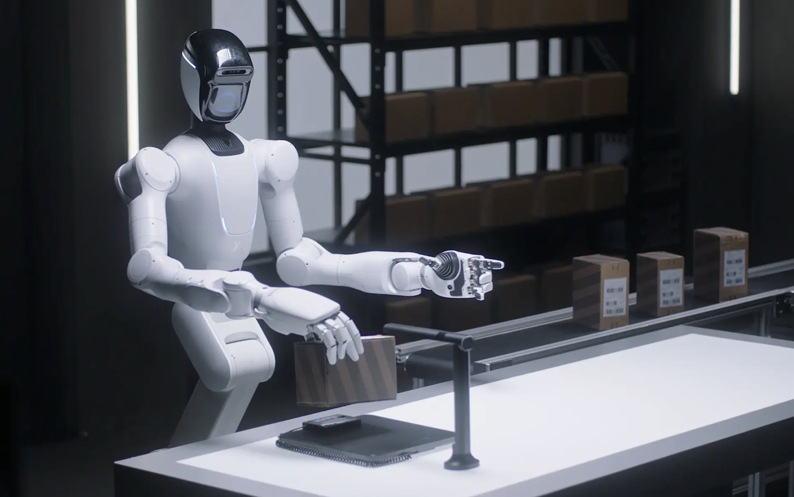 X Square Robot humanoid performing a pick-and-place task at a logistics workstation