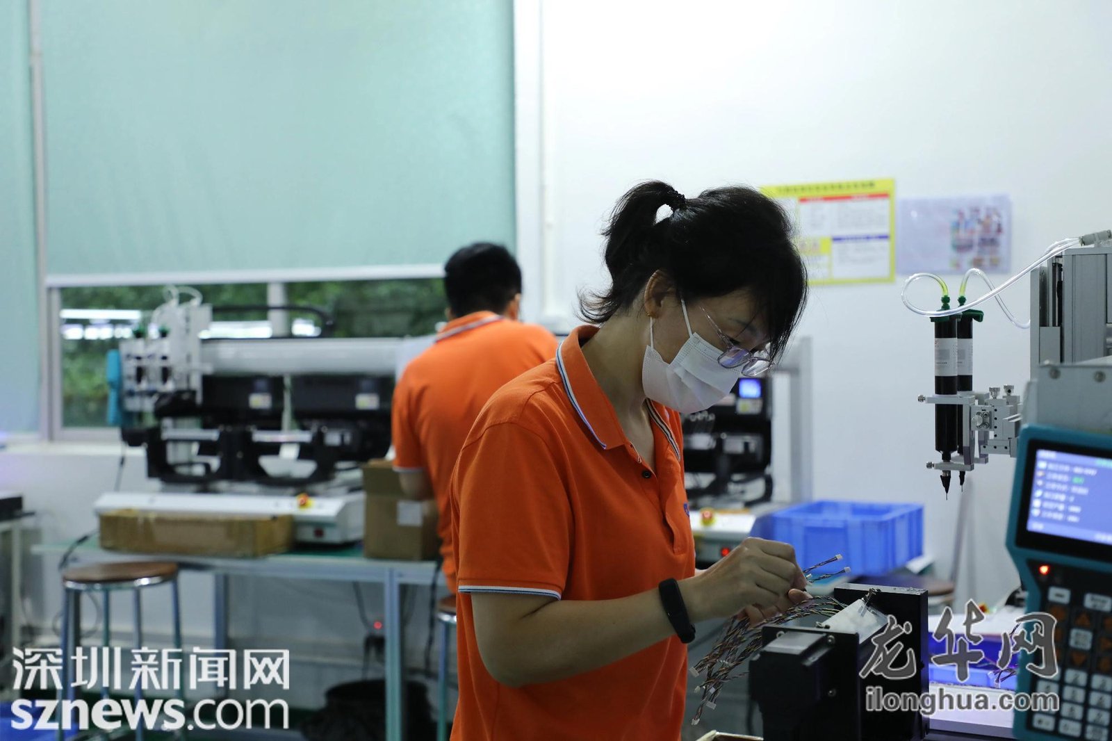 Shenzhen factory floor where disabled and able-bodied staff work side by side