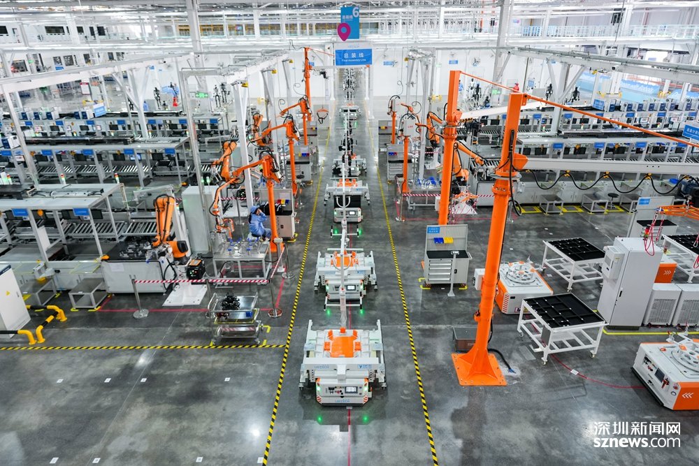 Collaborative robot arms working at the final assembly station