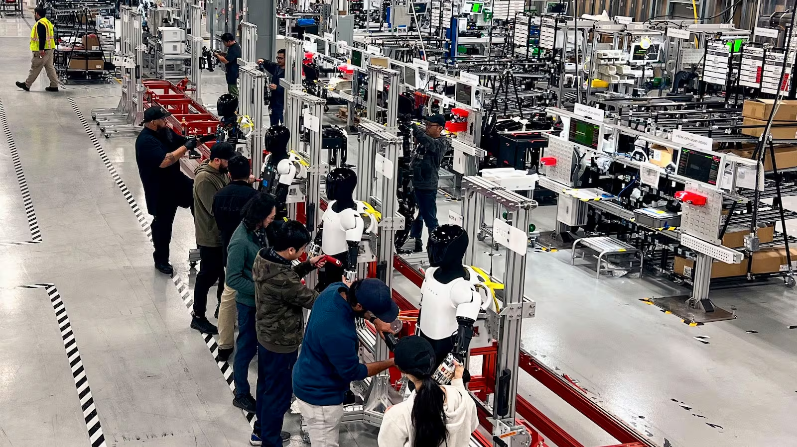 Tesla Optimus humanoid robot on a production line
