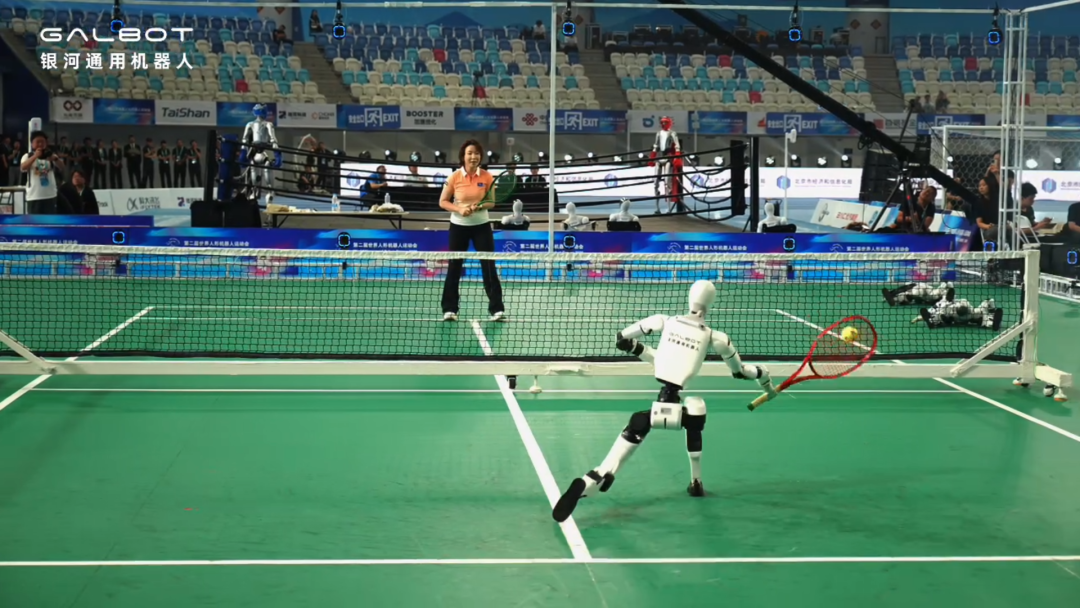 Galbot humanoid returning a tennis shot