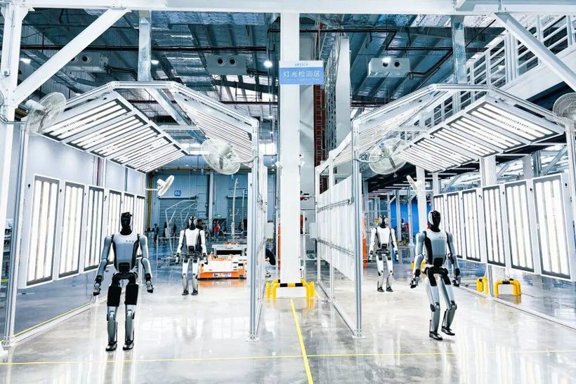 UBTECH industrial humanoid robots assembling on a smart production line