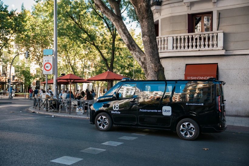 WeRide robotaxi with rooftop sensor array operating in a European city