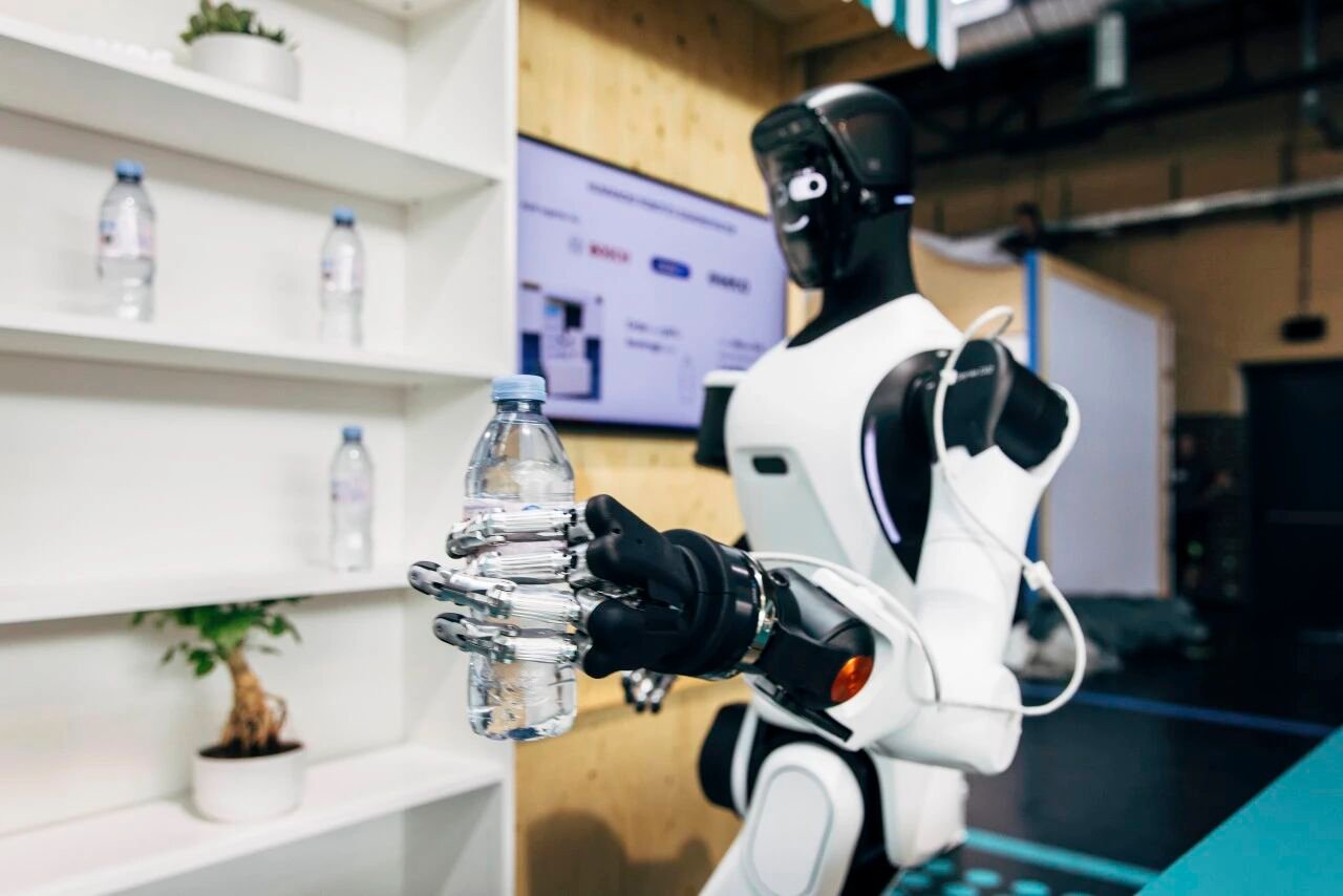 Robotic arm on an automotive component production line