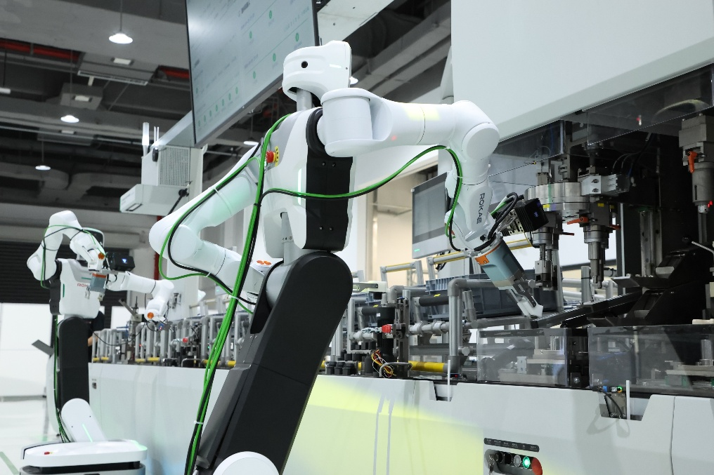 Schaeffler executives cutting the ribbon at the Taicang embodied AI factory opening