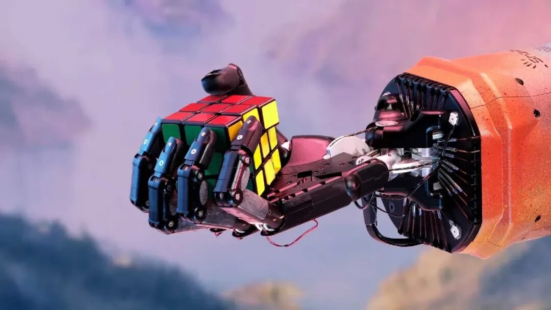 Robotic hand gripping a Rubik's cube illustrating physical AI manipulation