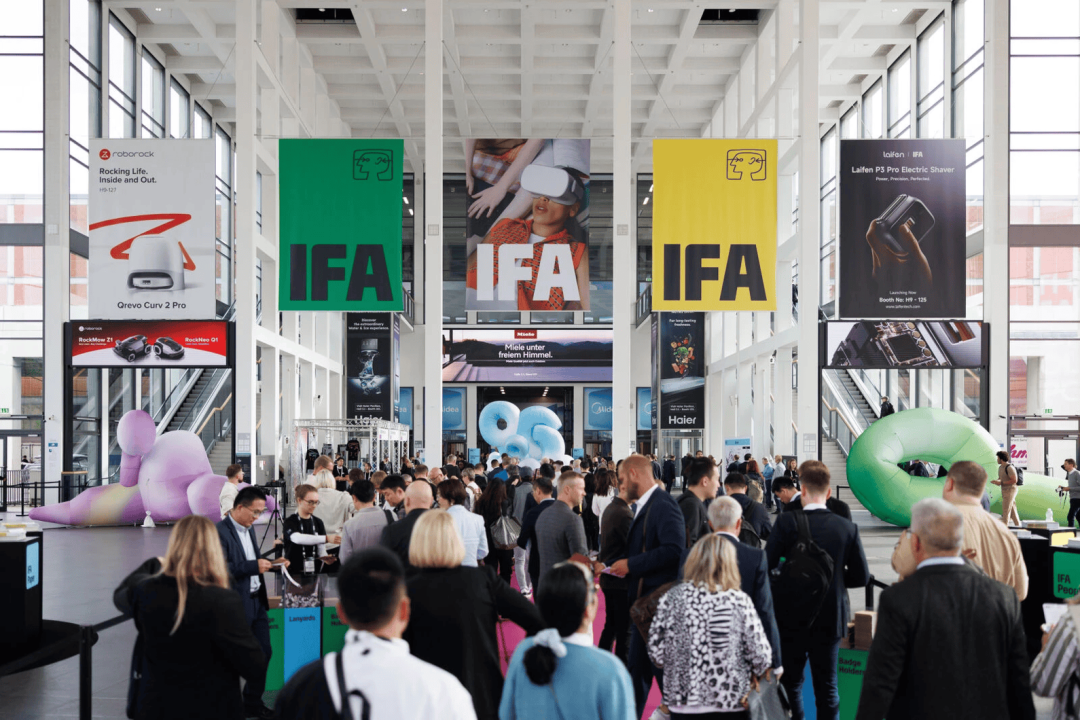 Humanoid robot demonstrated on a stage at a European electronics expo