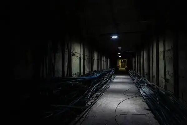 Quadruped robot navigating a narrow damp power tunnel